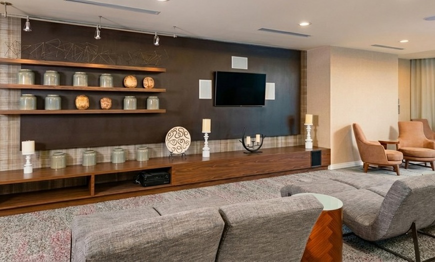 Image 8: Courtyard-Style Hotel Retreat with Outdoor Pool & Bistro Dining