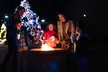 1.5 Mile Long Drive-Thru Christmas Lights Experience w/ Free Photos with Santa, Tasty S'mores & Savory Treats - Second Medium