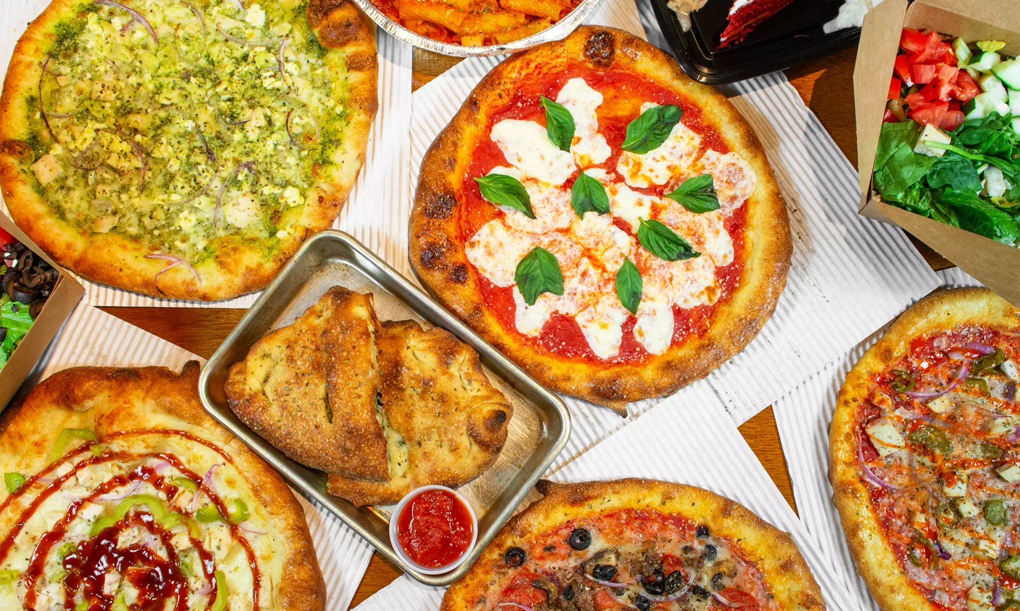 Gather, Share & Indulge with Pizzas, Wings, Salad & Desserts