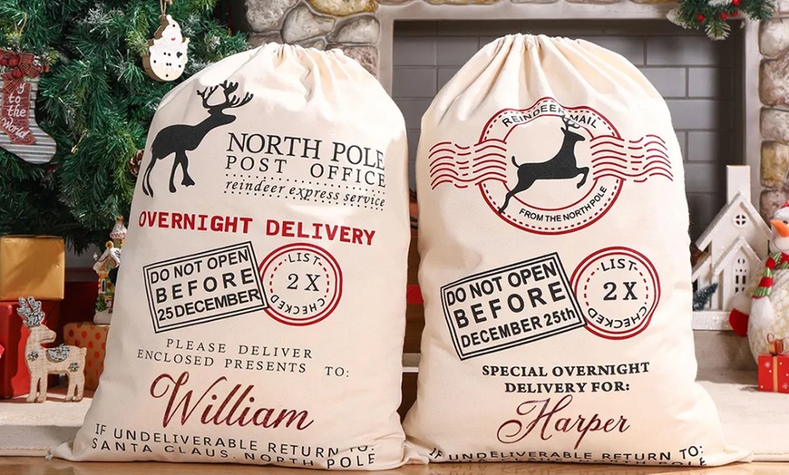 Image 7: Surprise loved ones with a festive, Personalized Santa Delivery Bag