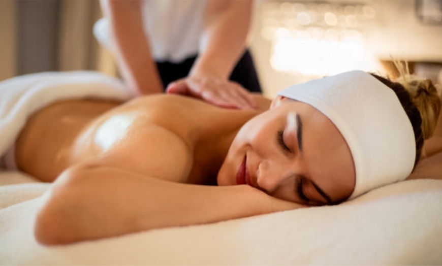 Image 1: Relax and Rejuvenate with Back, Swedish, Hot Stone, Lava, or Massages