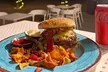 $20 or $50 Towards Food and Drink Or Dining Experience for 2 or 4 at Monty’s Dog Beach & Bar (Up to 42% Off) - Second Medium