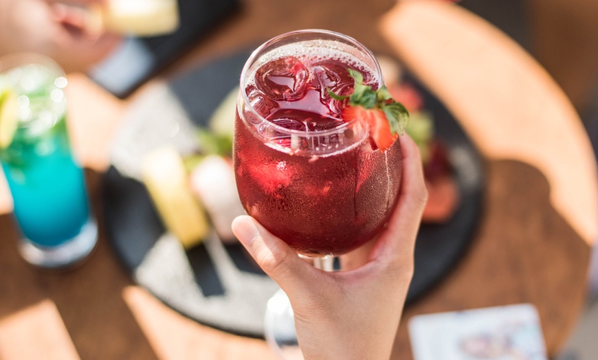Image 1: Unwind with 4* Mixed Beverages - Choice of 3, 6, 8, or 12