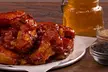 Large/Specialty Pizza, Wings, Beer/Wine, Drinks, $50 Credit, or More at Mountain Mike’s Pizza (Up to 22% Off) - Second Medium