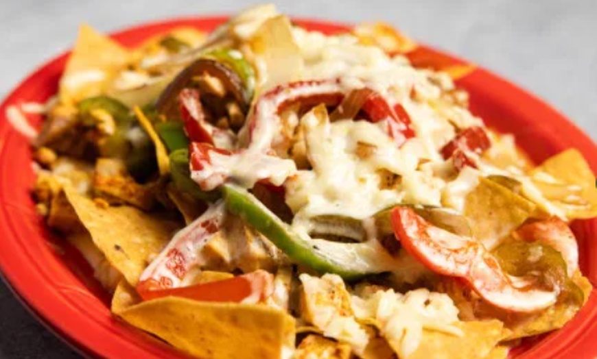 Image 1: Enjoy Authentic Mexican Cuisine with a Vibrant Atmosphere and Flavors