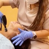 Image 1: Get Opus Plasma Treatment on Forehead, Hands, Face, or Face & Neck 