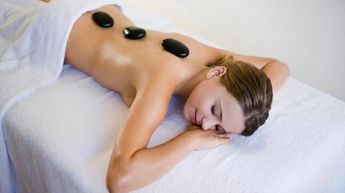 Relax at Riocali Recovery Center: Enjoy Hot Stone & Aromatherapy Massages (Up to 60% Off )