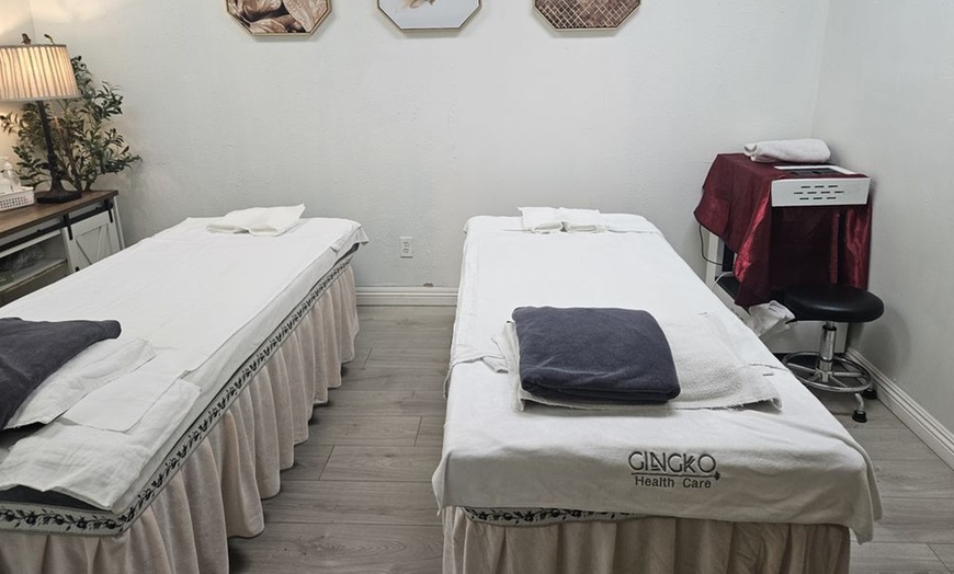 Image 2: Deep Tissue, Foot and Body Combo, Hot Stone, or Couples Massage
