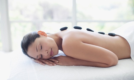 One 60 minutes Swedish body massage with Coconut oil, Essential oil and hot stones - One Spa