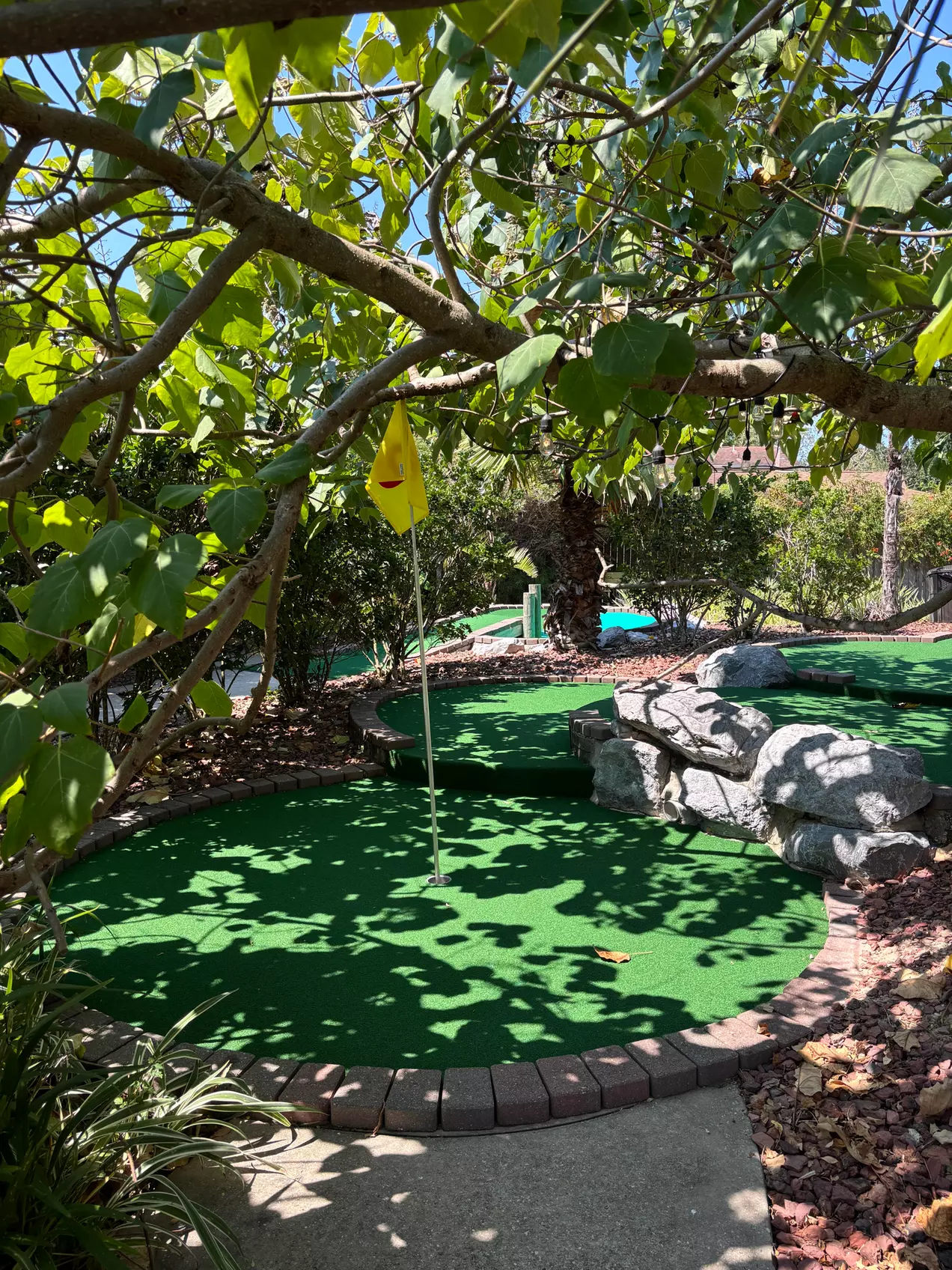 Swing into Fun: 18-Hole Round of Mini Golf with Sodas and Ice Cream