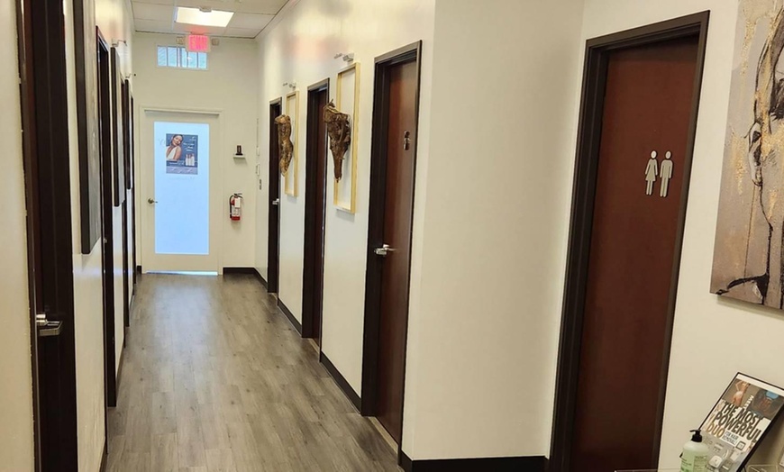 Image 3: 60-Min Swedish Massage with Hot Stone or Golden Facial Oil Treatment