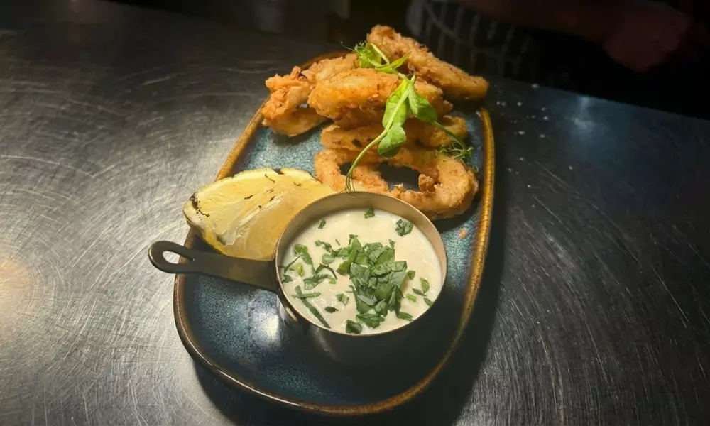 Enjoy a Two Course Country Pub Meal for Two, Three, or Four