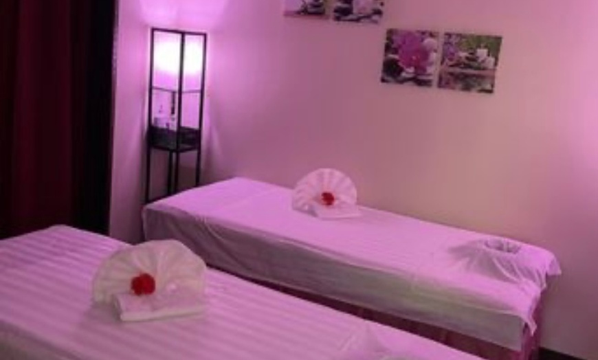 Image 2: Massage with Hot Stones for One or Couples at M&C Relaxation Spa