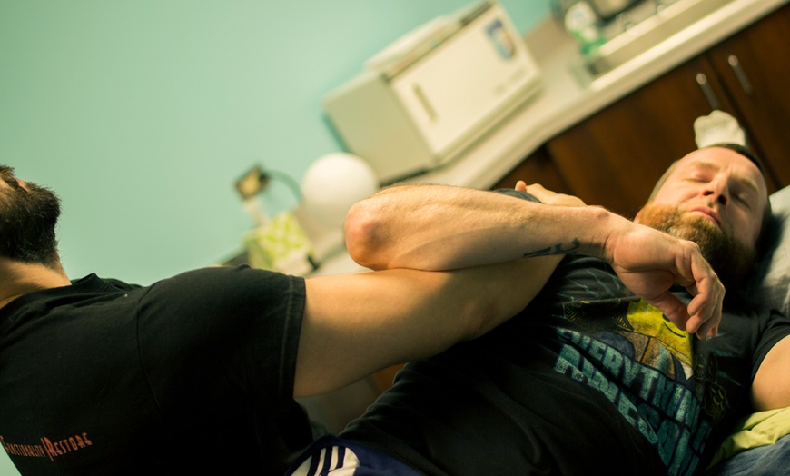 Image 3: 60-Minute Therapeutic Massage or 1-Month Table Stretch Session Package