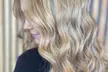 Brazilian Blowout or Keratin Treatment with Optional Haircut at Studio85 Up To  25% Off - Second Medium