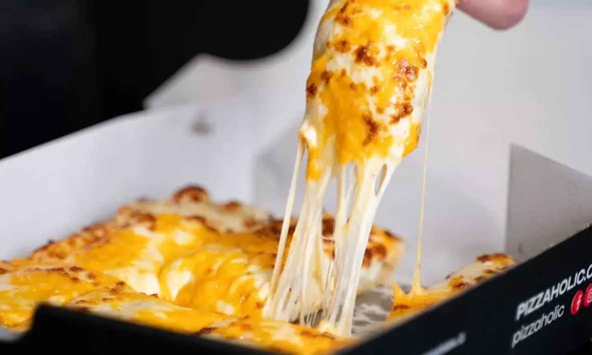 Credit to Spend on Food and Drinks or Large Signature/Classic Pizza