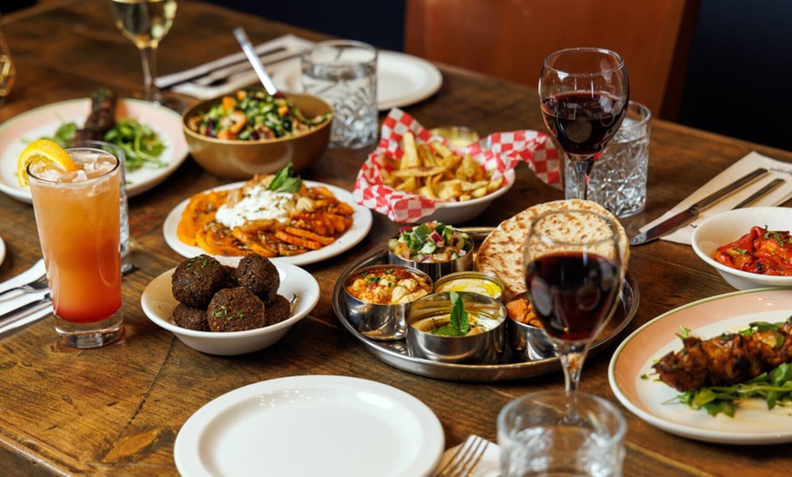 Image 1: Savour Local Flavours with Brunch with Mimosas or $50 Credit