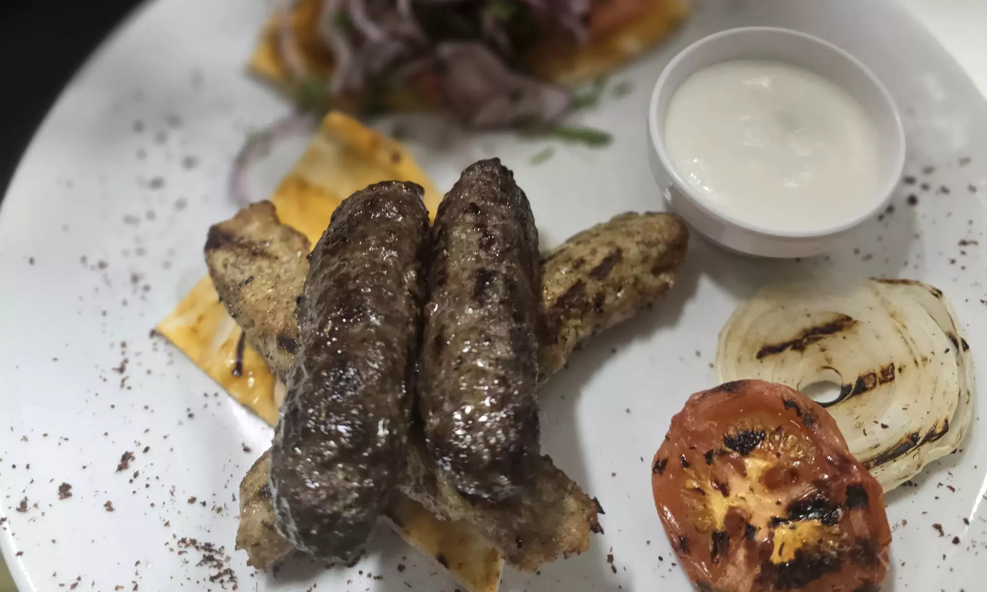 Choose any Main Course & Glass of Wine or Any Mezza For Up to Four