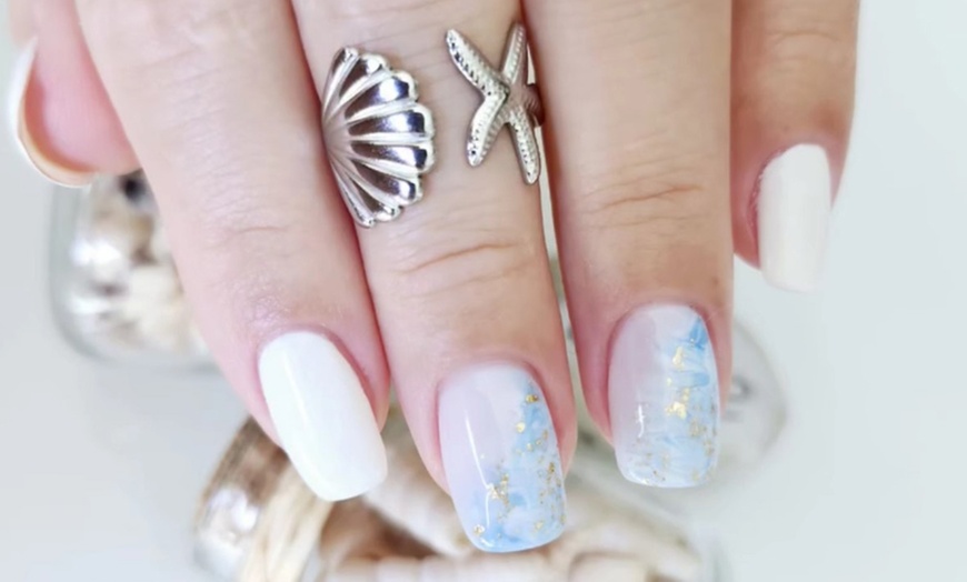 Image 1: Pamper Yourself: Classic or Spa Manicure or Pedicure or Mani-Pedi 