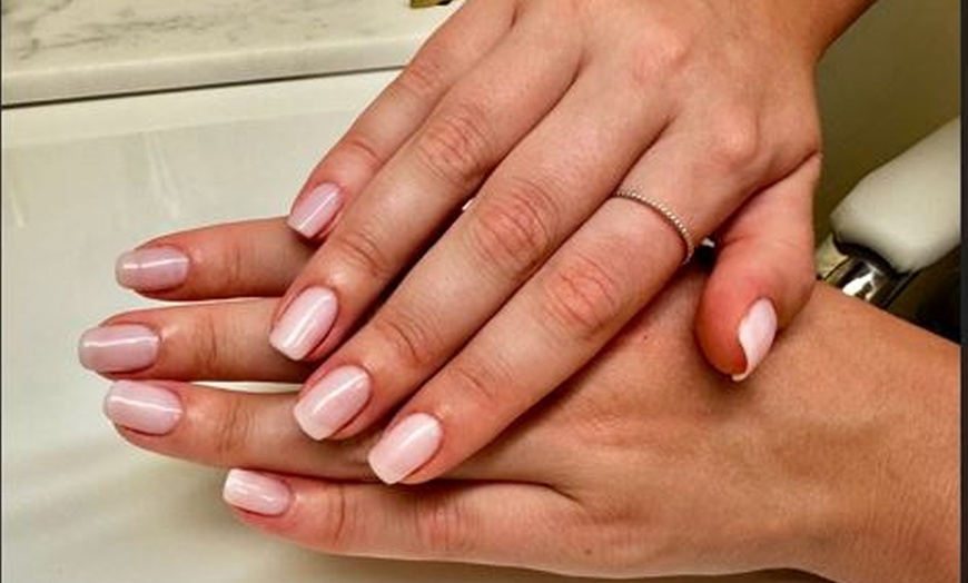 Image 2: European, Vitamin C or Customized Facial with 60 Minute Pedicure