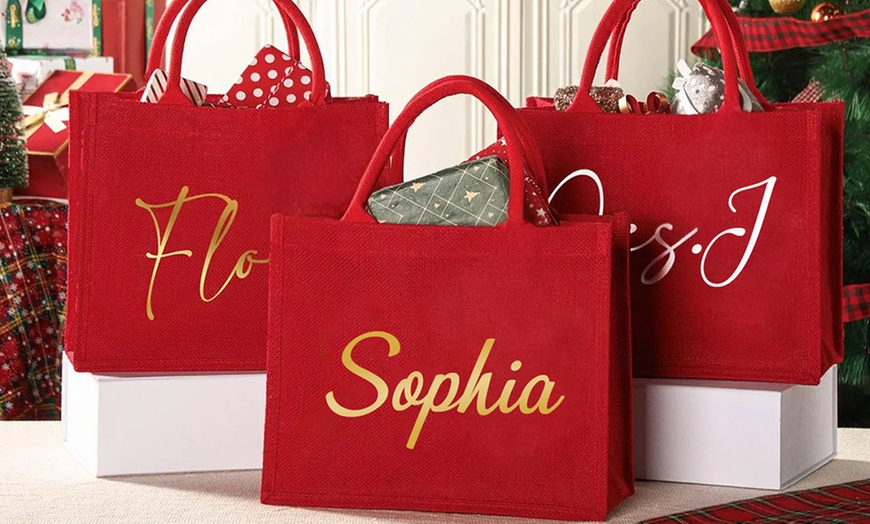 Image 4: Surprise loved ones with a festive, Personalized Santa Delivery Bag