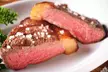 Brazilian Cuisine at its Best: All You Can Eat Churrasca for Two or Four and a Bottle of Wine (Up to 41% Off) - Second Medium