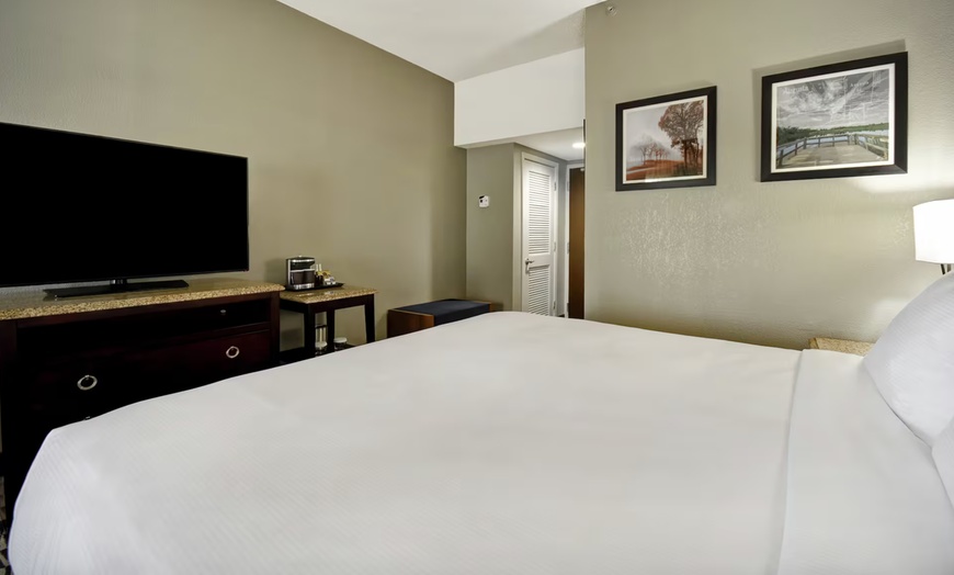 Image 5: Indoor pool, on-site dining, free parking & spacious rooms