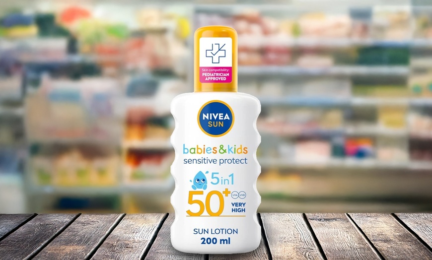 Image 1: Up to Three Packs of Nivea Sun Kids Protect and Sensitive Sunscreen 