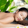 Image 2: Rejuvenate with 30 or 50-Min Deluxe Bodywork w/ Hot Stone for Solo or Couples at Qq Therapeutic Studio (Up to 50% Off)