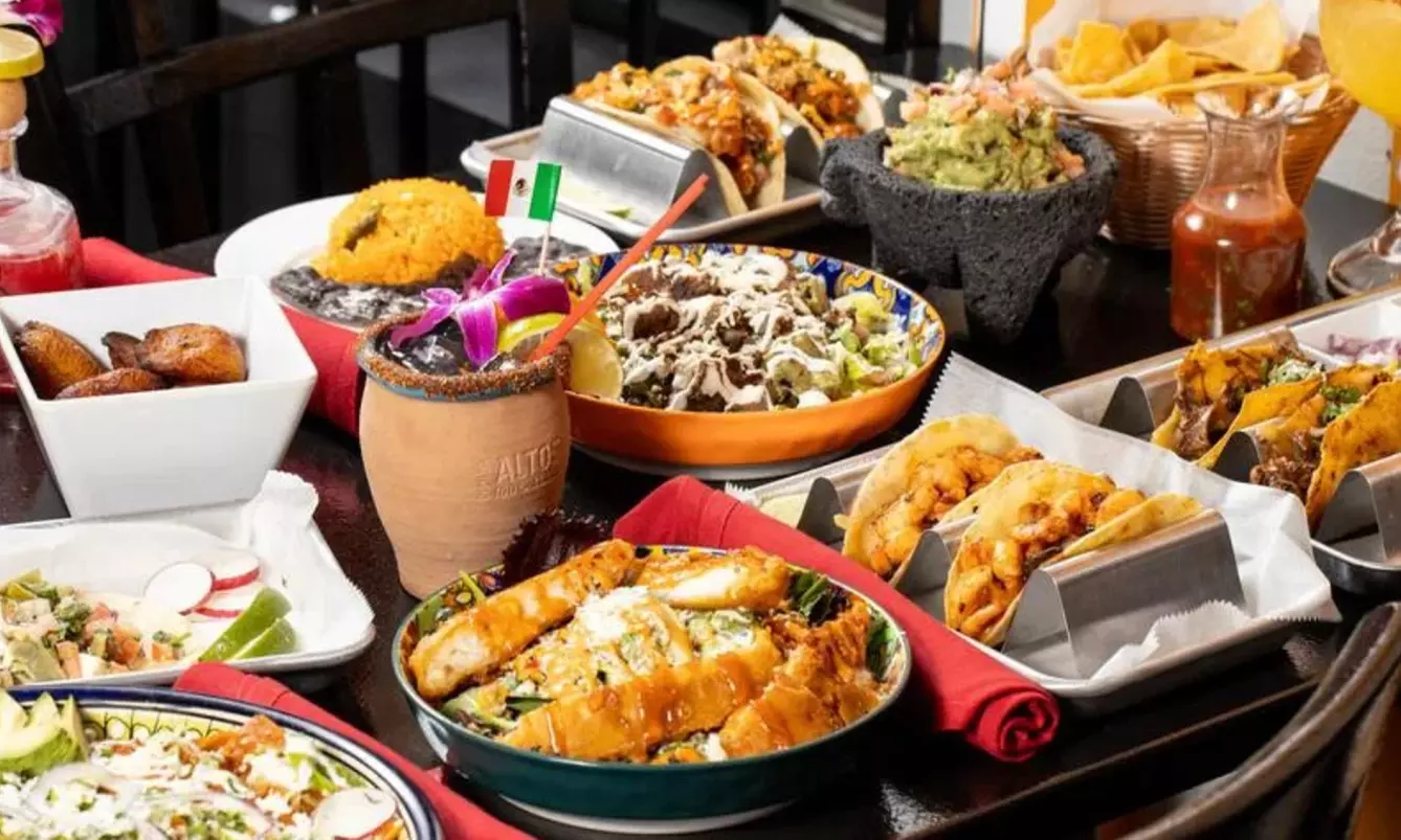 Vibrant Rooftop Dining: Choose Meals, Margaritas, or Dining Credit