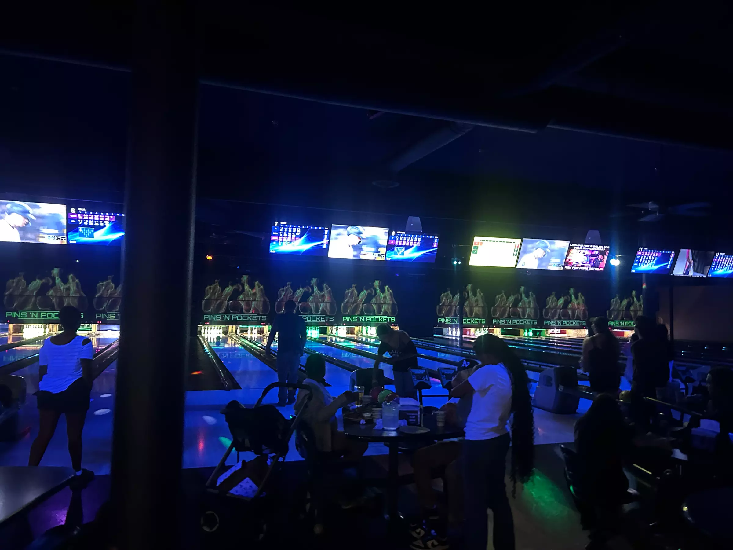 Experience Cosmic Bowling with Glowing Lanes and Laser Lights!
