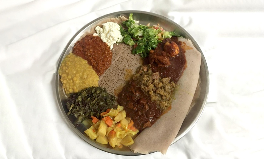 Image 1: Enjoy Dining Credit or Authentic Ethiopian Cuisine