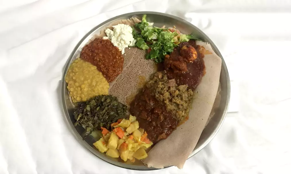 Enjoy Dining Credit or Authentic Ethiopian Cuisine