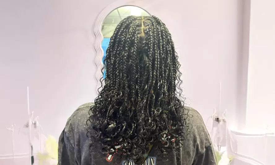 Achieve a Fresh Style with Small, Medium or Large Knotless Braid Session or Men's Braids ( Up to 49% Off ) - Primary Image