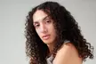 Elevate with One Silk Press Treatment, Blowout, Style, Woman Haircut, Shampoo, Conditioning & More(Up to 59%Off) - Second Medium