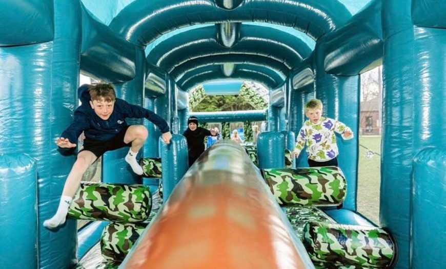 Image 8: Bounce Camp: Family Tickets for 640ft Inflatable Obstacle Course Fun
