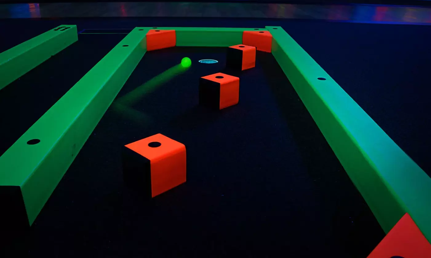 Glow-in-the-Dark Mini Golf with Vibrant Challenges – Norman