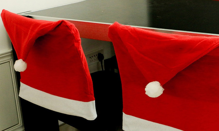 Image 4: Christmas Santa Claus Hat Design Dining Chair Slipcovers Chair Back Covers