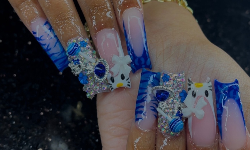 Image 1: Up to 51% Off on Nail Salon - Mani-Pedi at Nuhriality