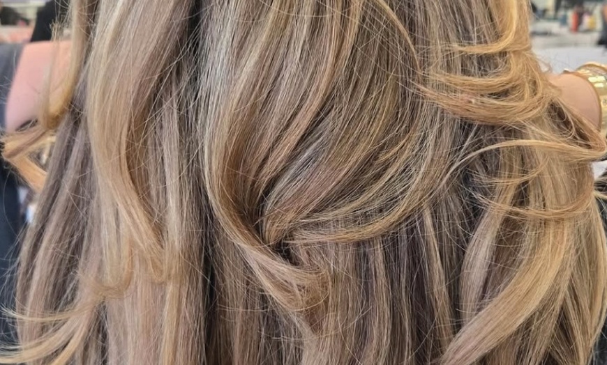 Image 1: Elevate Your Style with Haircut or Curly Haircut, Wash, and Blowout 