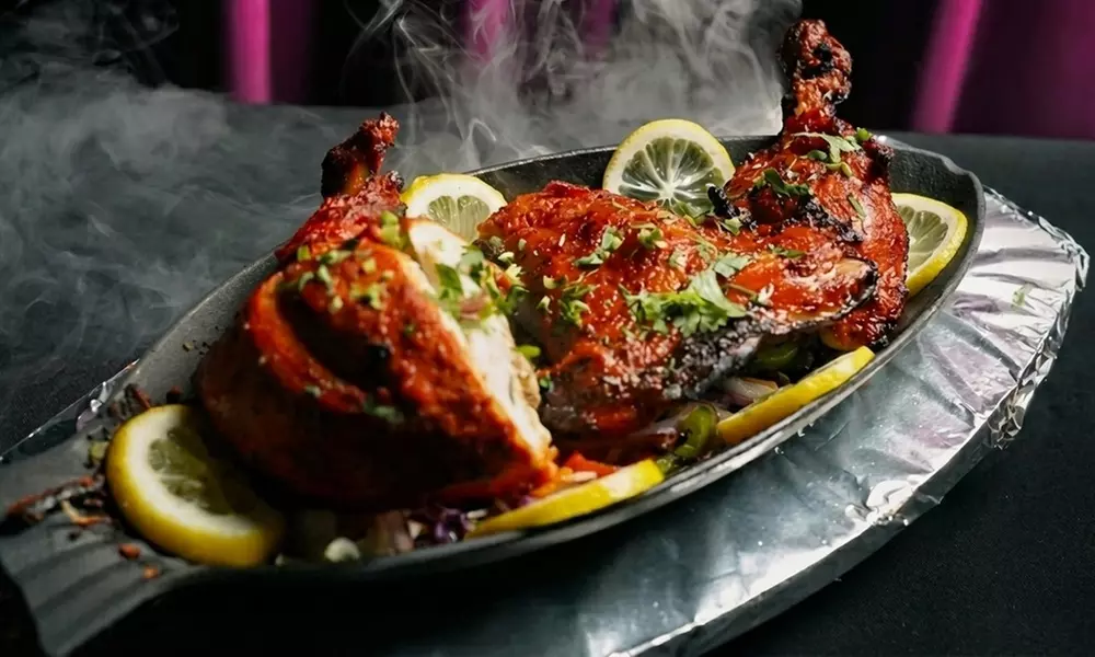 Authentic Indian Dining in Winter Park with Entrees, Naan & Drinks