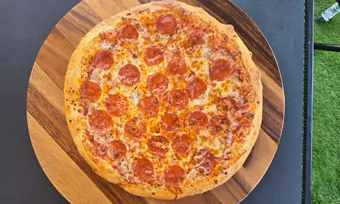 Appetizers, Large Salad, 14'' or 16'' Specialty Pizza, & More 
