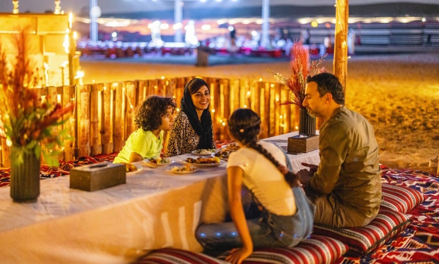 Image 3: Dive into Adventure: VIP Seating, 45-Min Dune Bashing & Falcon Photo