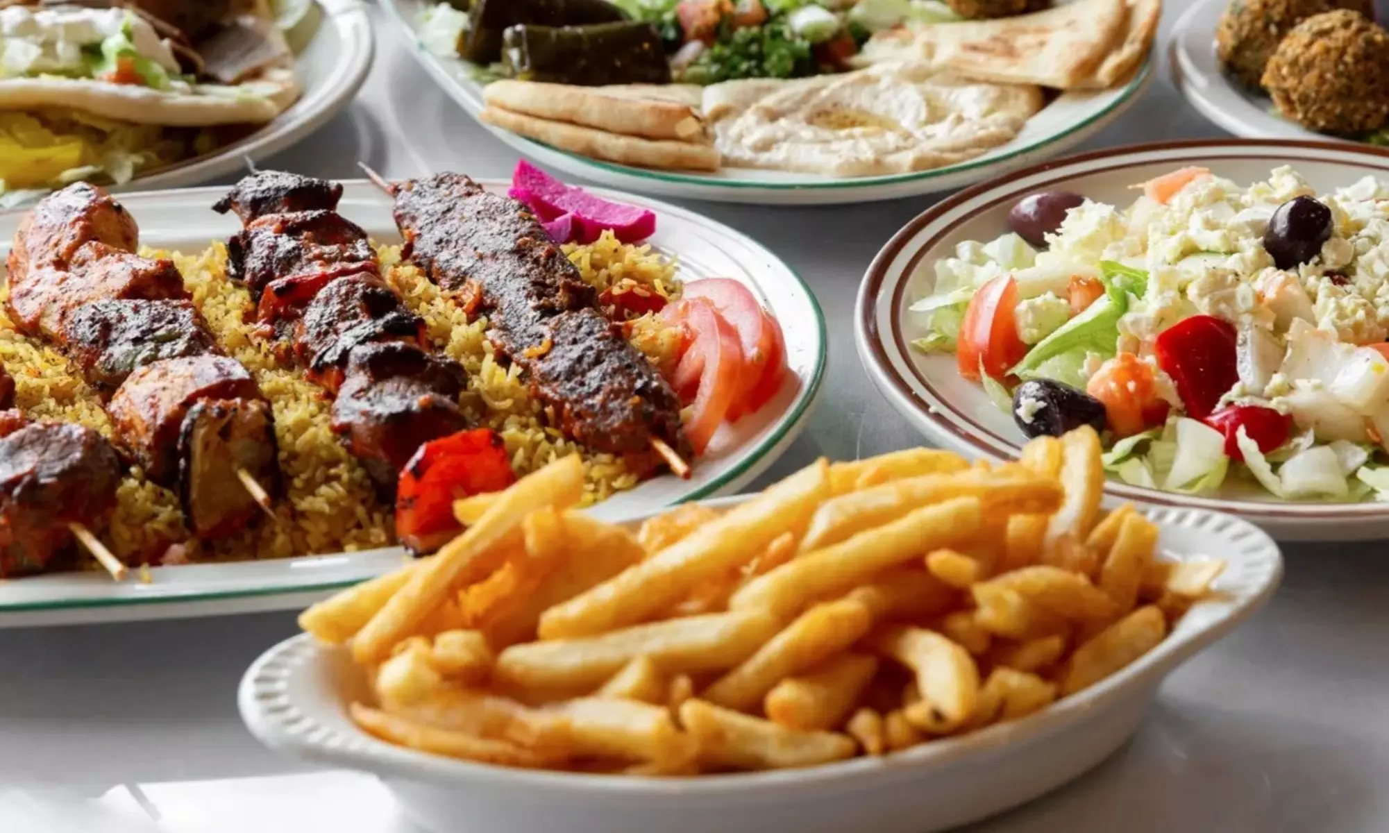 Mediterranean Food and Drinks for Takeout at Taste of Jerusalem Cafe (Up to 18% Off). Two Options Available.  - Primary Image