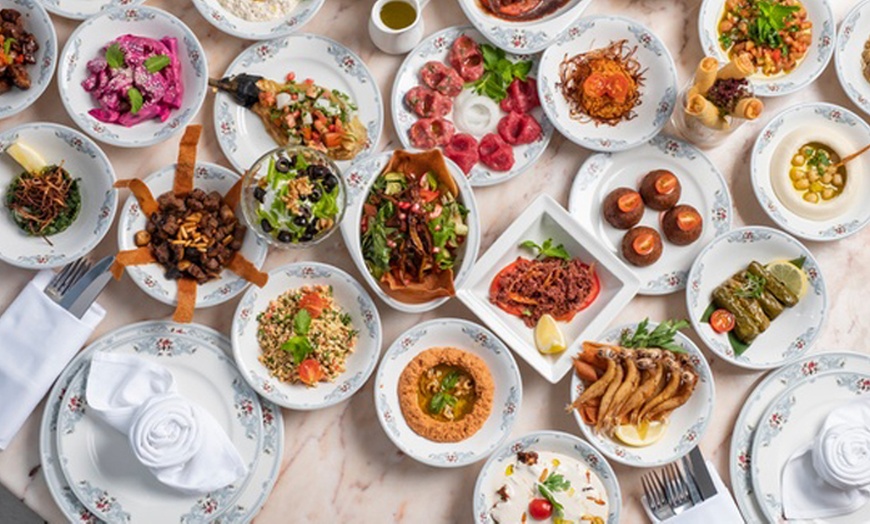 Image 1: Sharing-Style Menu for a Child (AED 45) or 1, 2, or 4 Adults (AED 85)