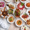 Image 1: Sharing-Style Menu for a Child (AED 45) or 1, 2, or 4 Adults (AED 85)