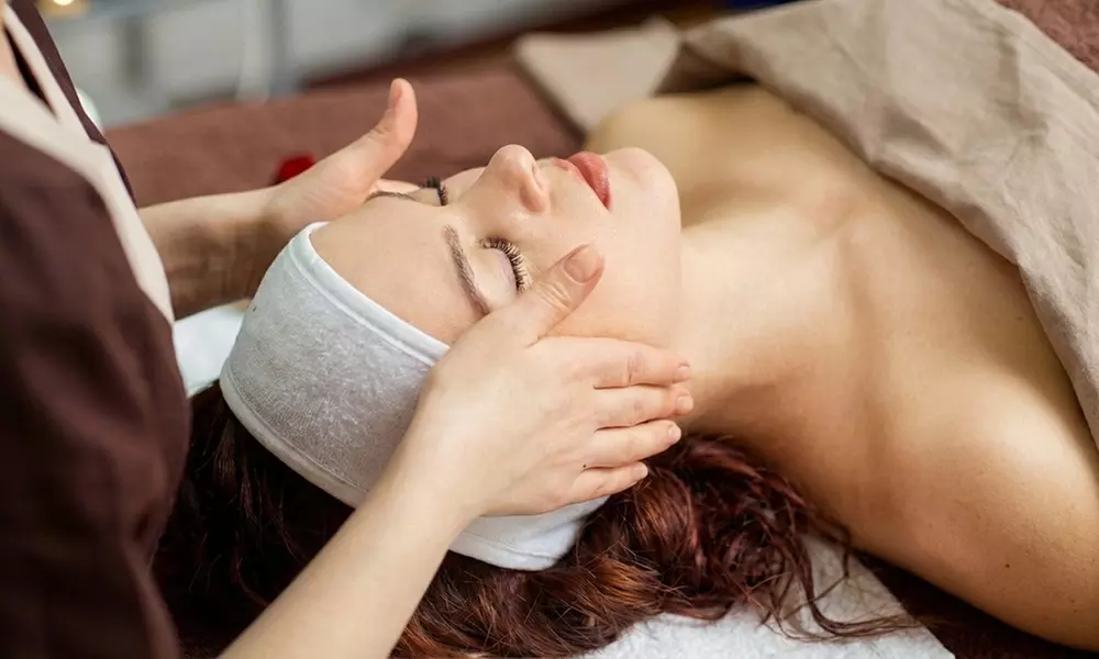 Smooth Skin w/ Four Sessions: Laser Hair Removal on Two or Three Areas