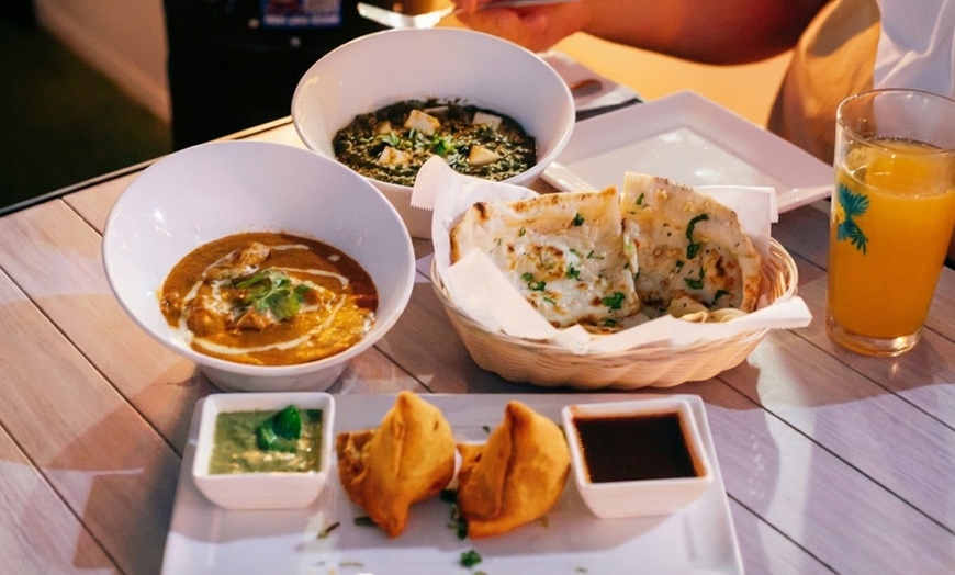 Image 16: Food & Drink Credit for Worldly Cuisine & Handcrafted Cocktails