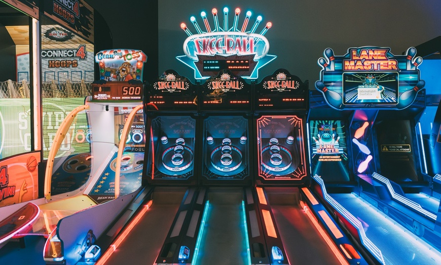 Image 1: Unleash the Fun: 50% Off Arcade Game Card at Boomers