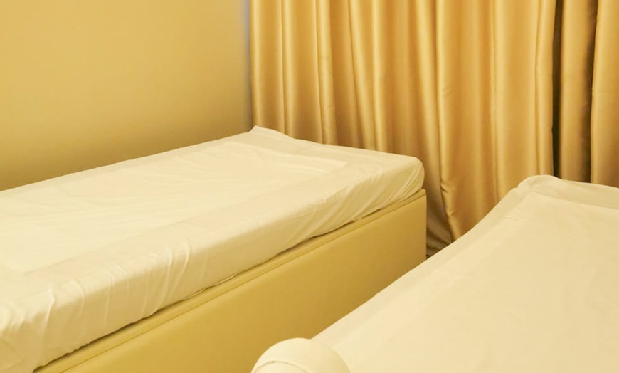Image 4: 60-Min Thai, Swedish, Deep Tissue or Hot Stone Full Body Spa Treatment